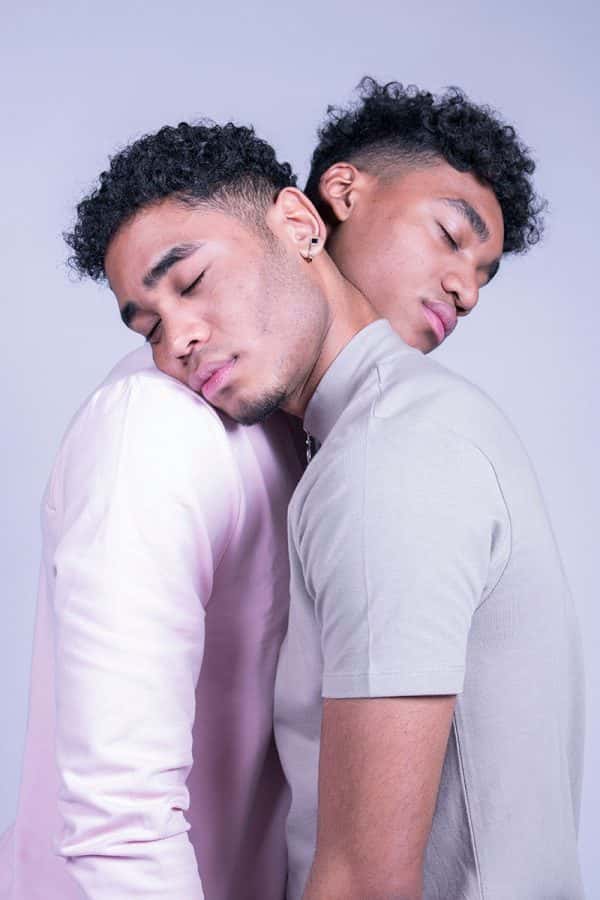 Chante Johnson - Image of two male models leaning on each other's shoulders wearing pastel coloured clothing