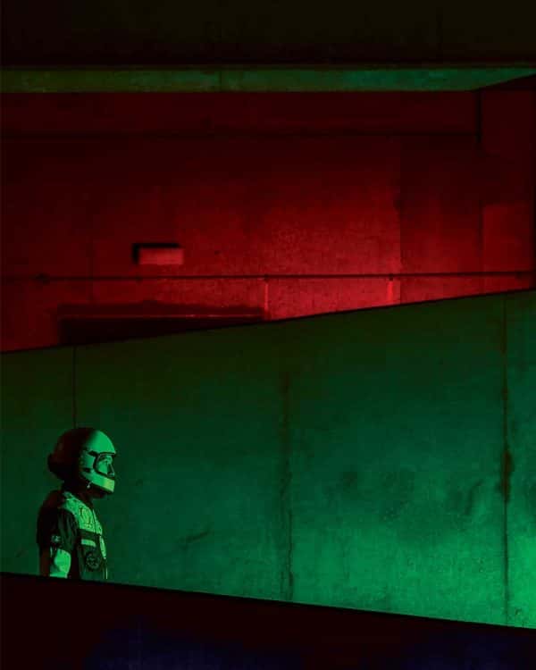 Hannah Gordon-Smith - Image of a ma dressed in a space suit in a red and green background