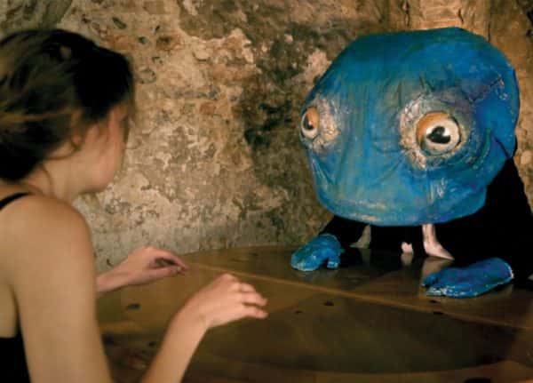 Lila Babington - Image of a girl talking to a blue stop motion puppet