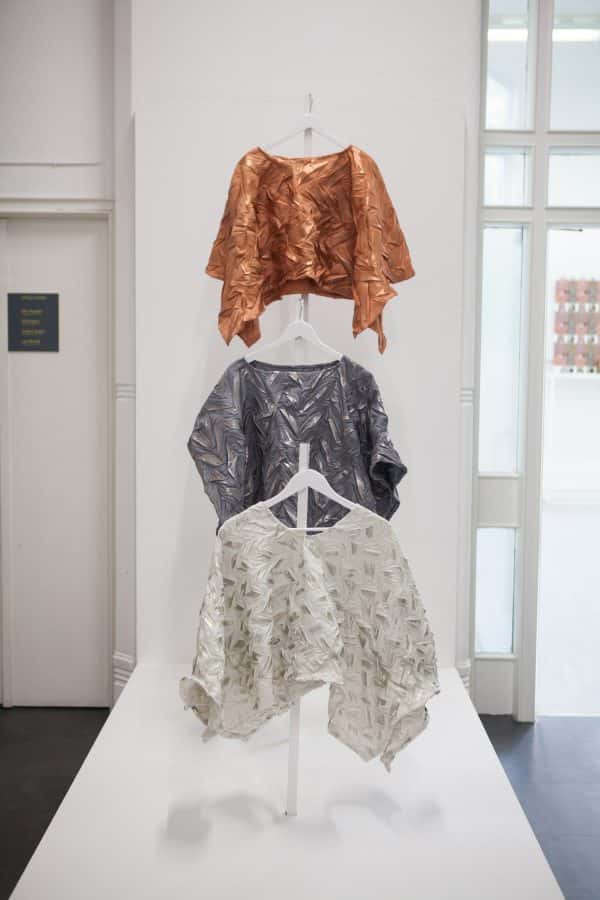 - Three textile design garments hanging in the BA Degree Show 2017