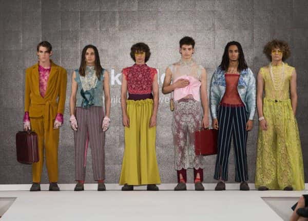 Jack Wildash - Image of a male collection featuring bright colours and lace garments by NUA Fashion student Jack Wildash at Graduate Fashion Week