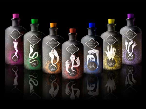 Laura Edwards - Image of designed sour shots bottles featuring illustrations of snakes and bright colours