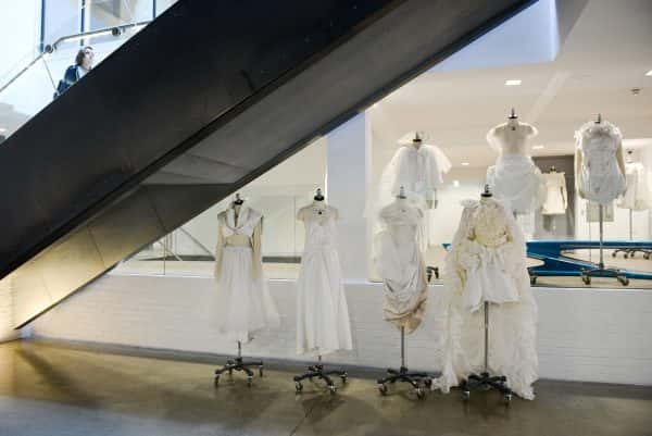 - Photograph of mannequins with white clothes inside the entrance foyer of NUA's Guntons Building