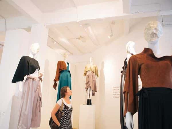 Uziar Khan, MA Fashion - Image of designs by MA Fashions student Uzair Khan on display in a gallery space as part of the MA Degree Show