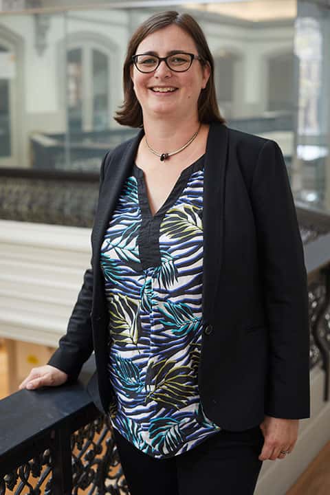 Anna Poston, BA Architecture Lecturer at Norwich University of the Arts standing in the Boardman House building