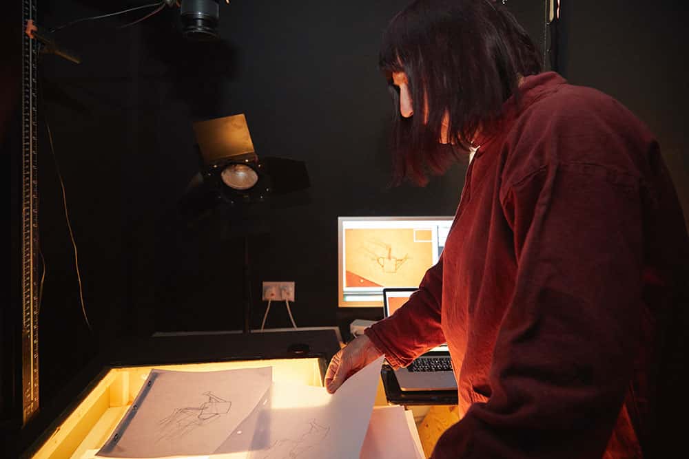 Suzie Hanna working in her animation studio
