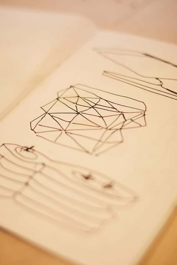 In the studio with Desmond Brett - Desmond Brett sketches of his sculptural work in a book