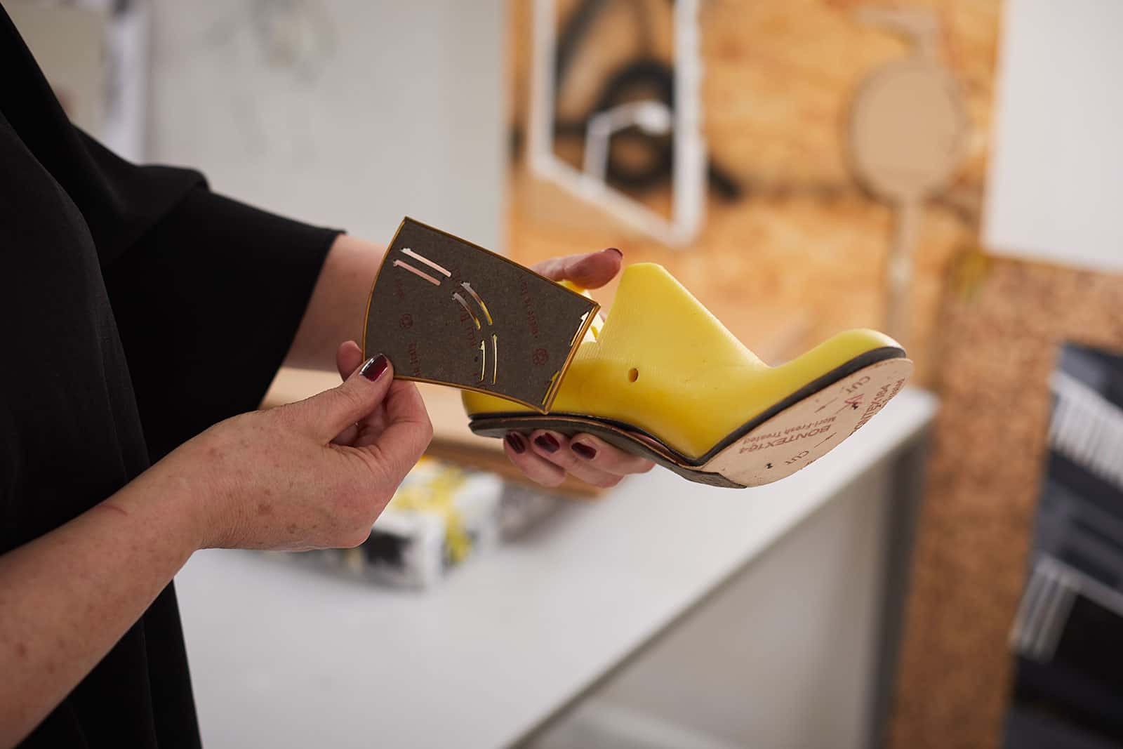 Marie Brennan, head of postgraduate courses at Norwich University of the Arts works on her shoemaking in the NUA Fine Art studio