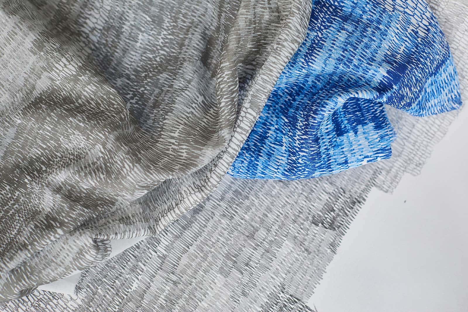 Cloth designs by BA Fashion and BA Textile Design Course Leader Kate Farley - showing blue and grey cloth