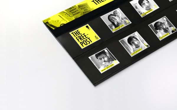 Tom Hardwick - A mock up of a black envelope, with a yellow lip. The envelope has six stamps; 5 black and white photos of human rights activists, and one yellow stamp saying 'The Free Post'. The work is part of an award-winning project by graduate Tom Hardwick.