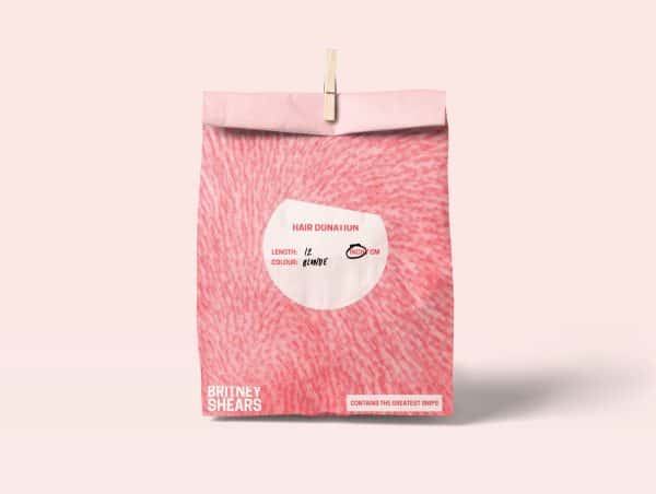 Kirsty McKinlay - A mockup of a pink paper bag with the 'Britney Shears' branding by BA Graphic Communication student Kirsty McKinlay