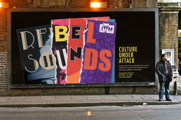Lauren Kirby - Branding for Rebel Sounds using letters from different sources, with a ripped paper effect on a billboard