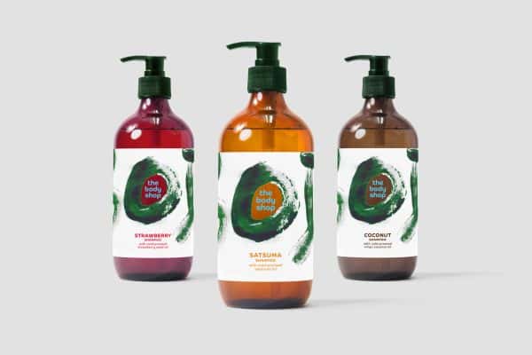 Lauren Kirby - Body Shop shower gel packaging design. Three bottles, one strawberry, one orange and one brown bottle with green brush strokes