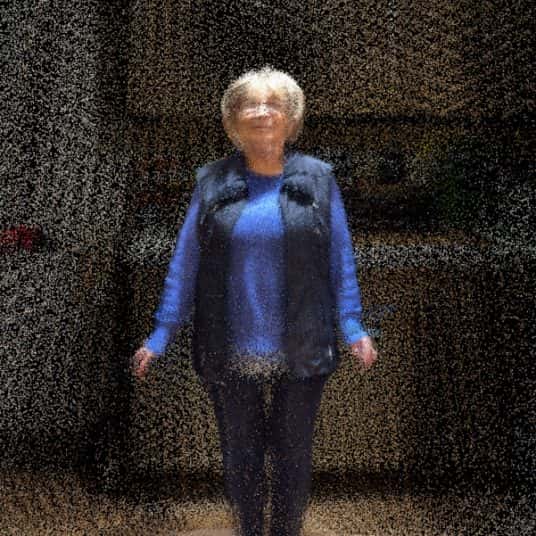  Image showing photograph of 3D site mapping of a old person wearing blue standing in the middle of a kitchen